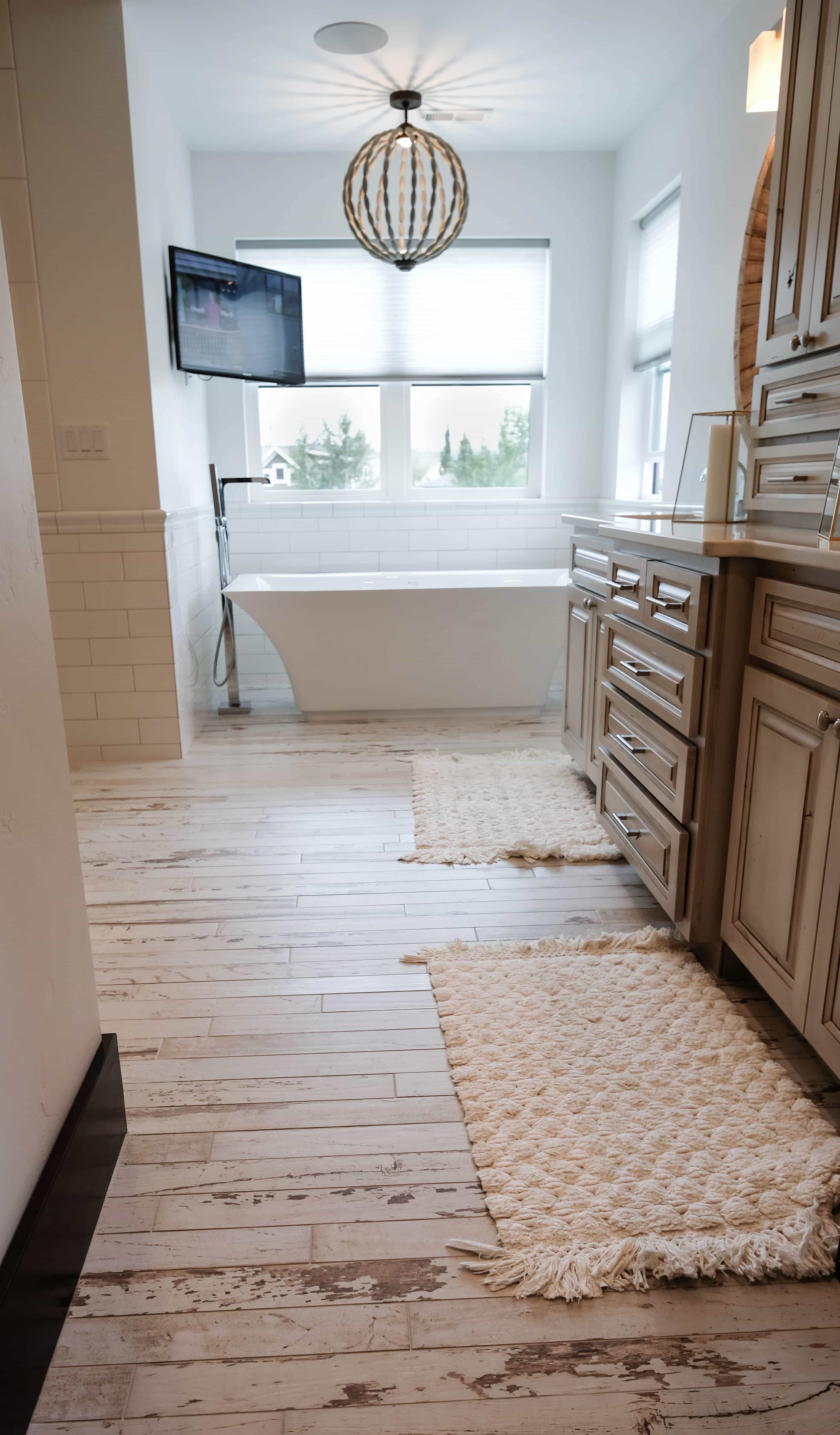 Parade of Homes Master bathroom with rustic barnwood floor