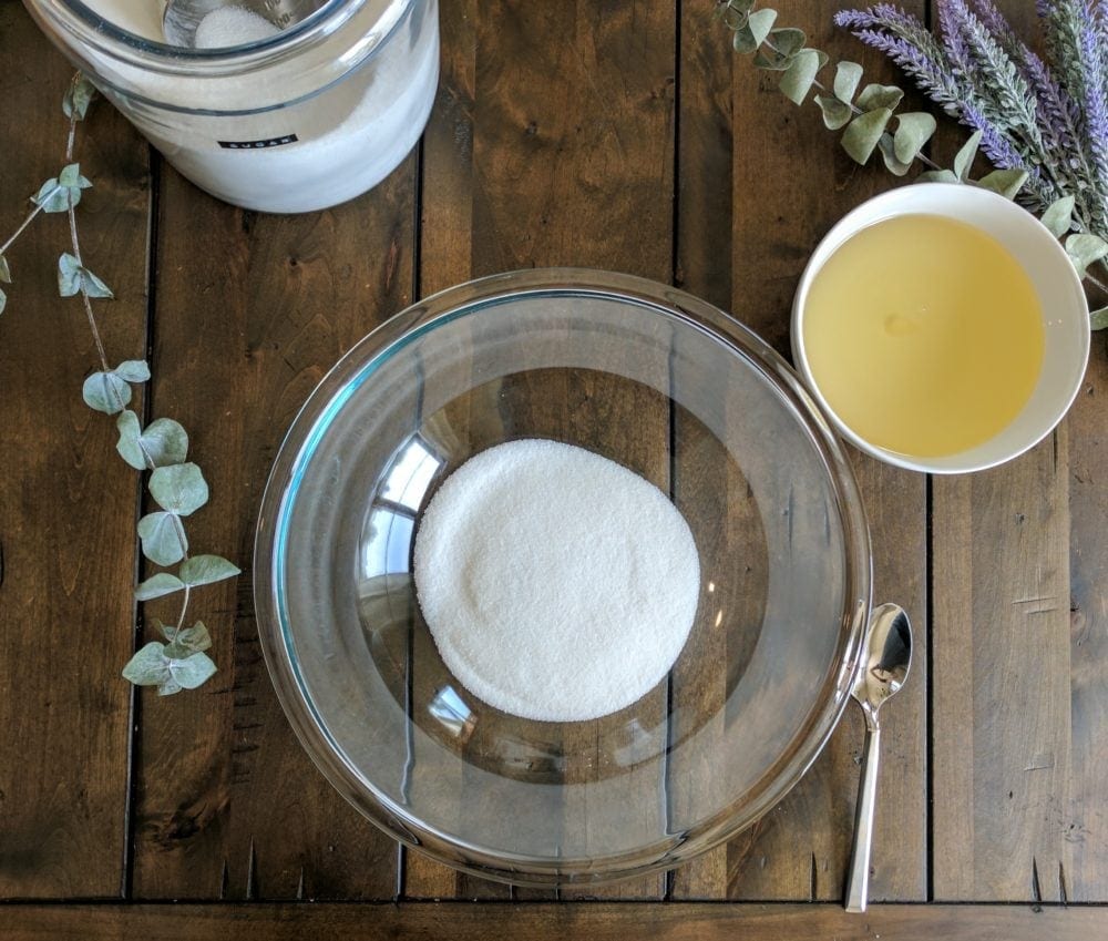 adding the sugar into DIY Sugar Scrub