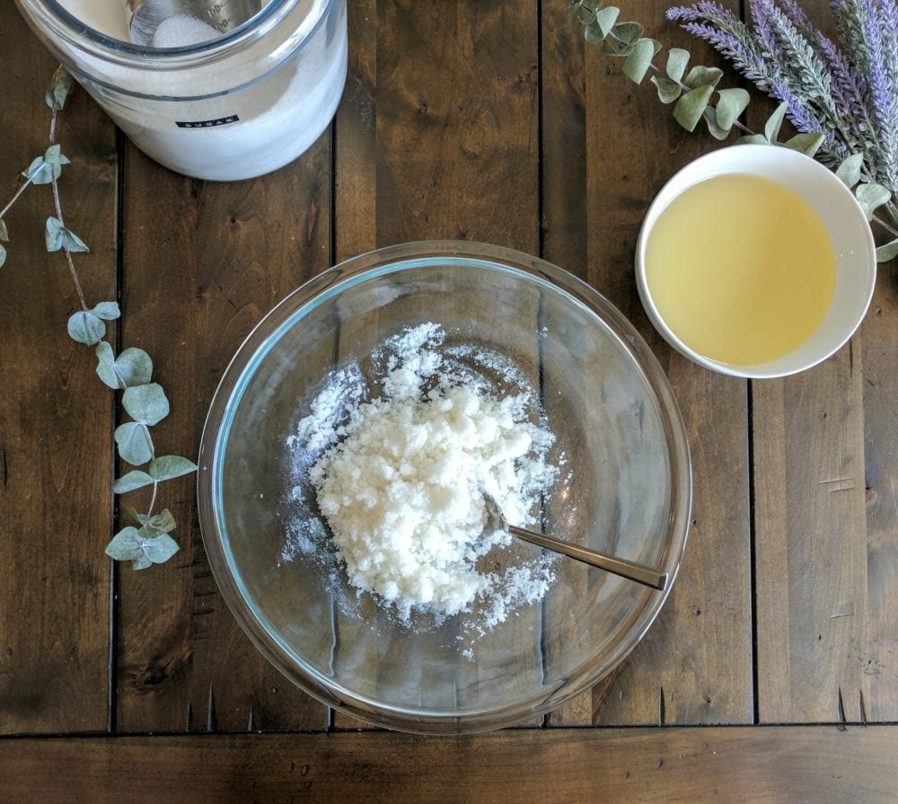 adding the coconut into DIY Sugar Scrub