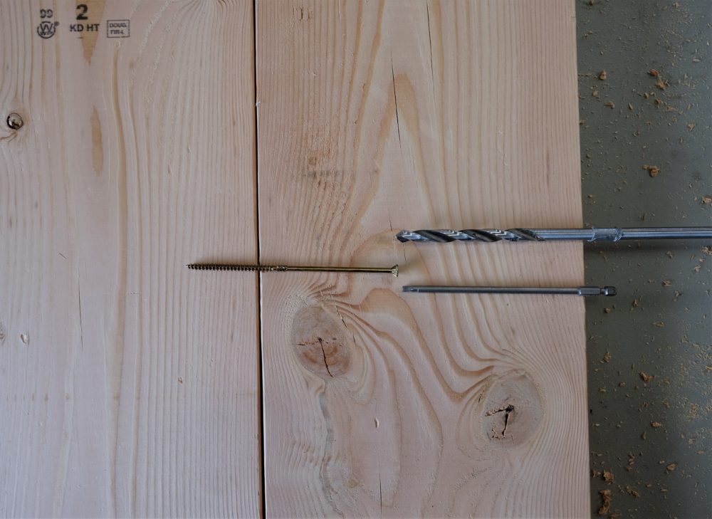 Wood Boards and screws laid out to make rustic coffee table