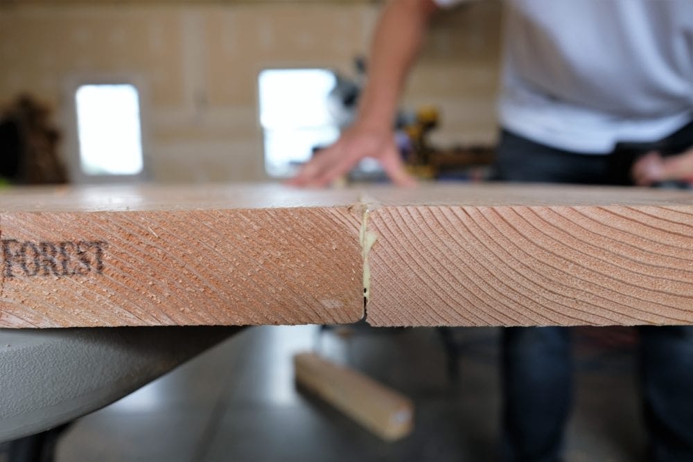 gluing boards together to make rustic coffee table