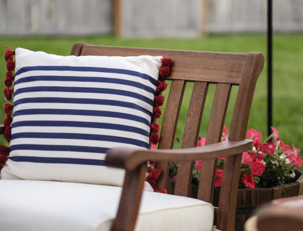 outdoor patio chair with throw pillow