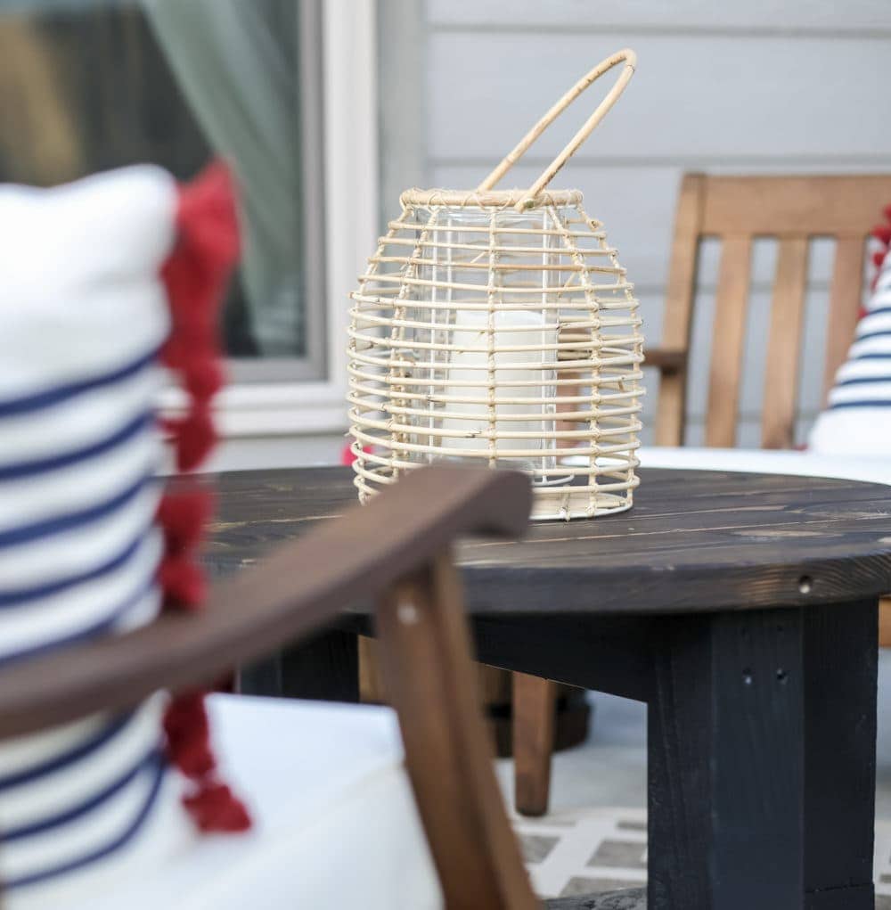 outdoor patio with lantern on the coffee table