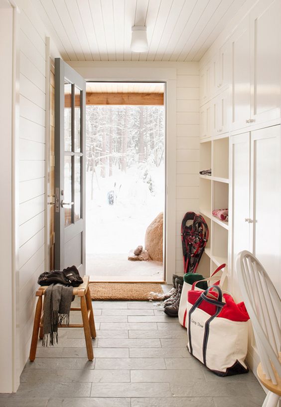 mud room with ship lap walls an ceiling painted with Swiss Coffee by Benjamin Moore 