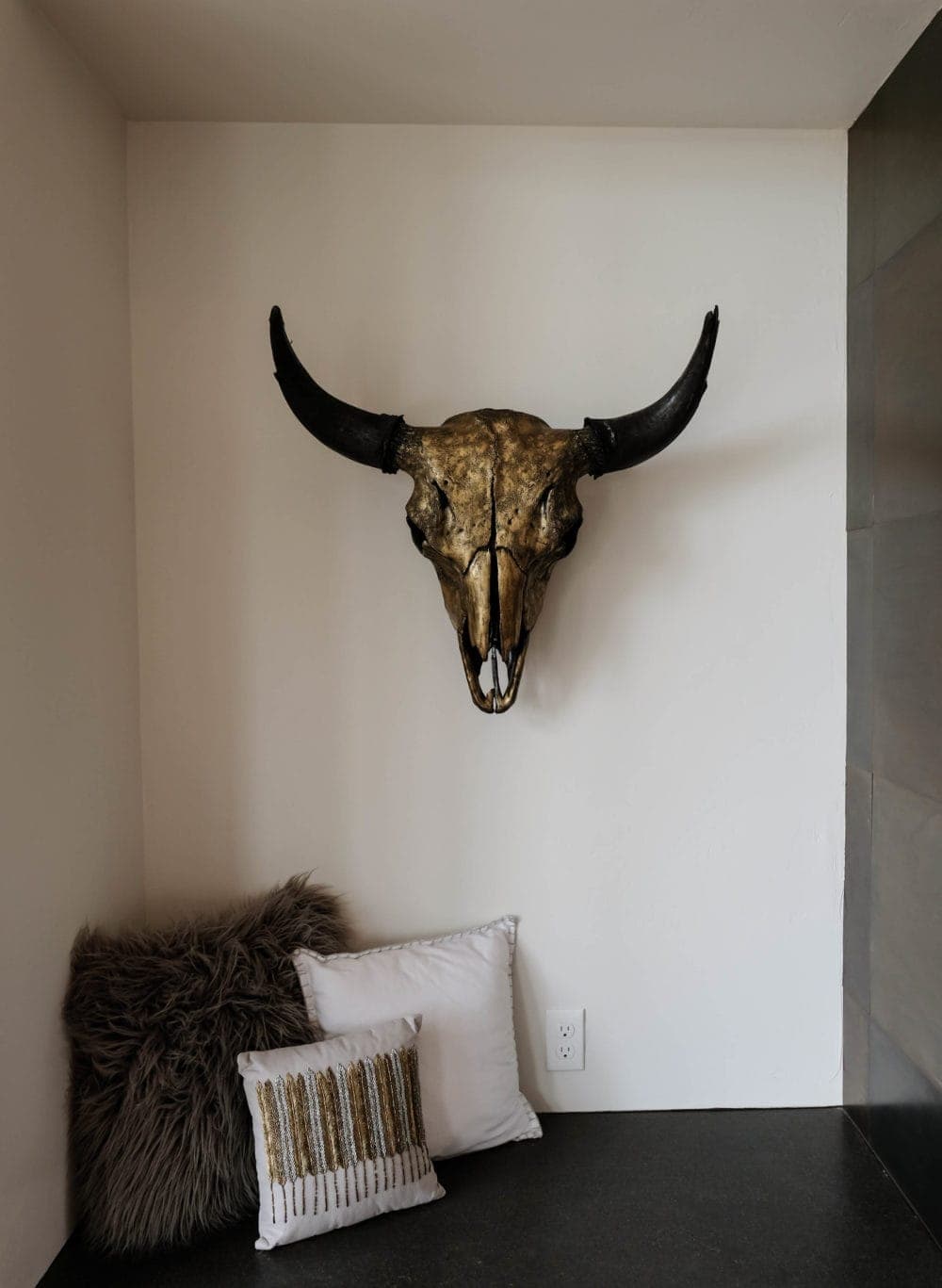 Parade of Homes gold bull skull and horns