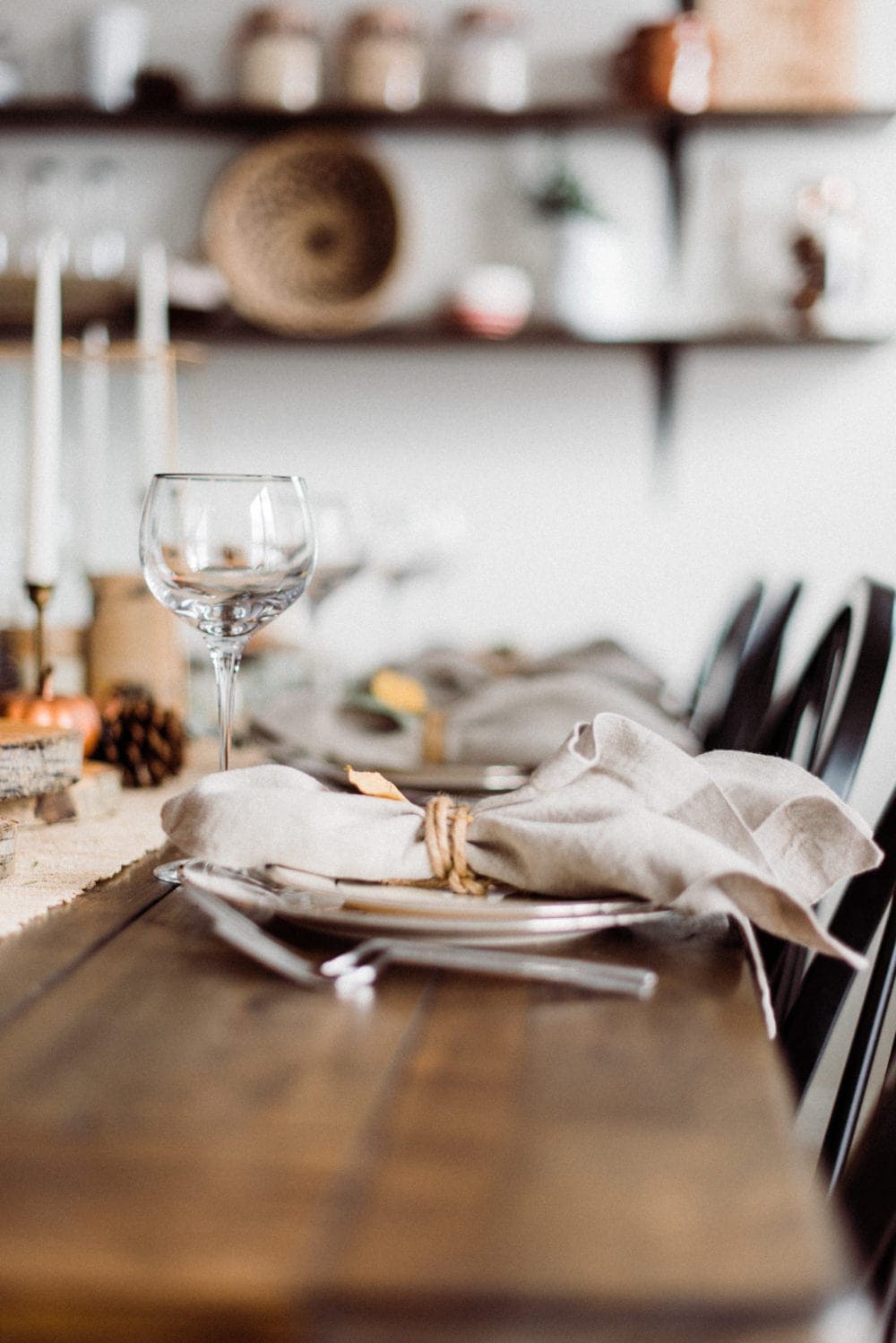 thanksgiving table place setting with wine glass