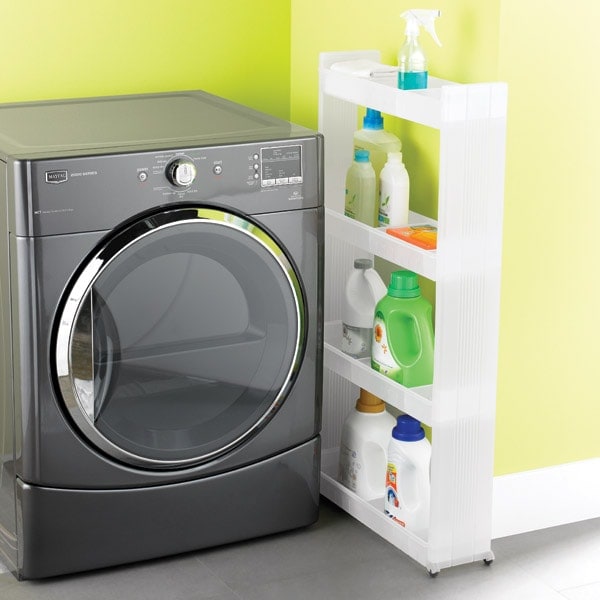 Cheap organization products including a narrow rolling storage cart in between a washing machine and the wall