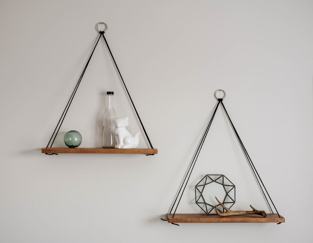 hanging shelves styled with decor