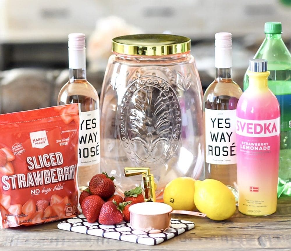 Ingredients for summer sangria recipe on countertop