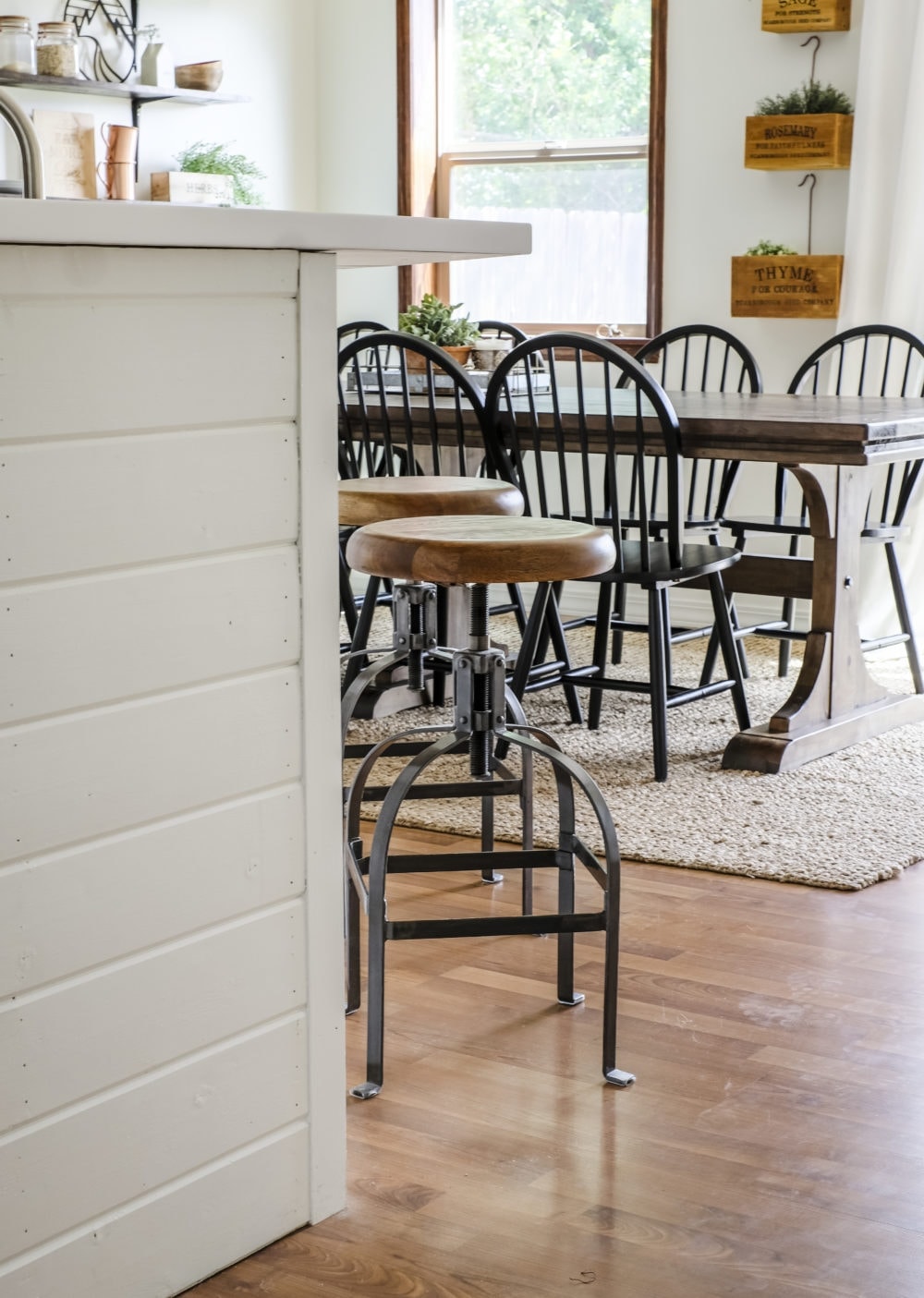 breakfast bar with dining room in the background