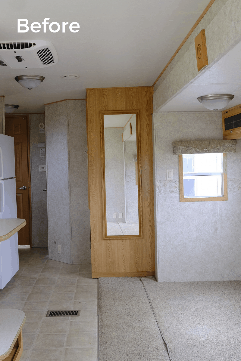 RV kitchen remodel before photo of original pantry with a long skinny mirror on the side