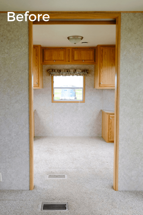 Before photo of an RV home office makeover that looks like a second bedroom