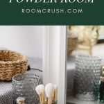 powder room accessories on a bathroom countertop