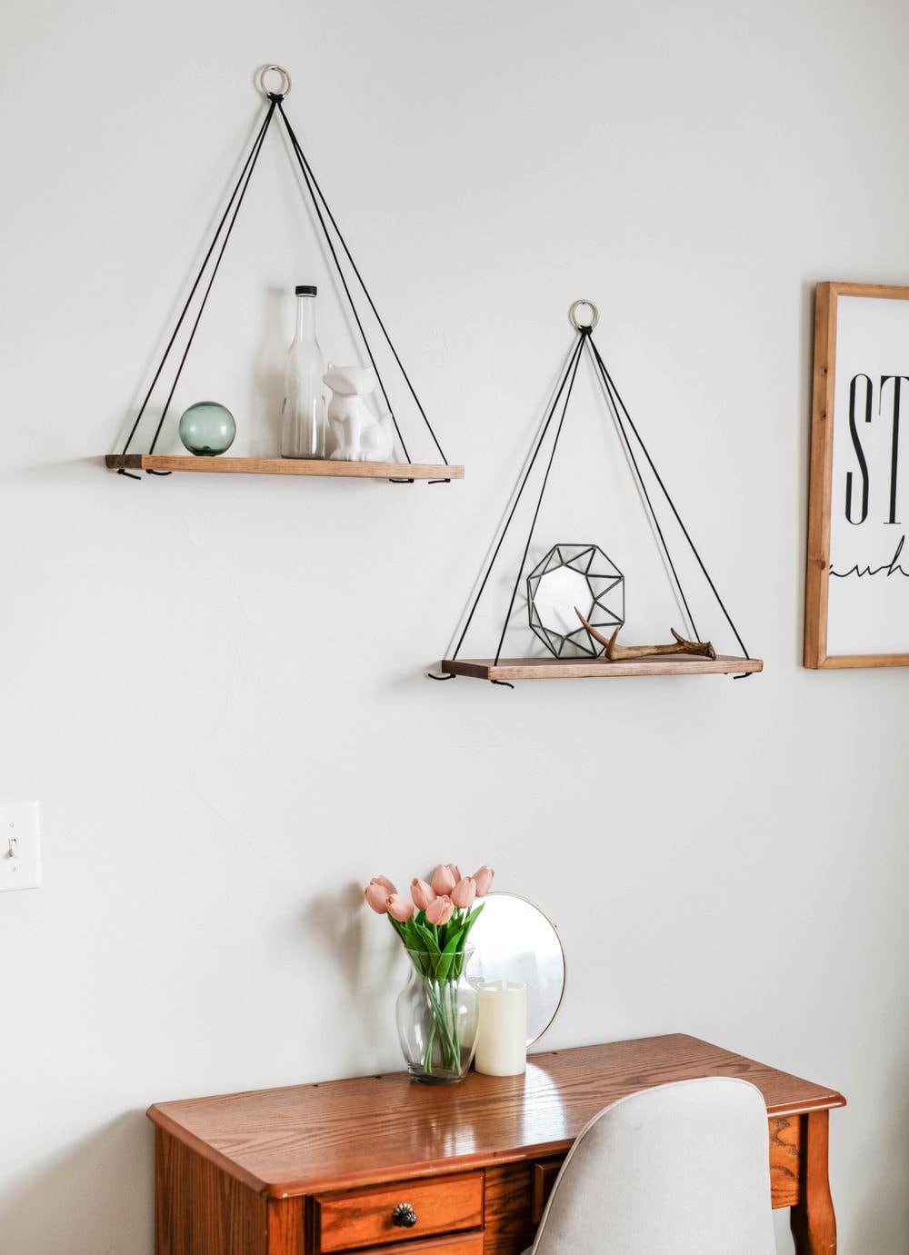 wall hanging shelfs with light bright decor on a white wall