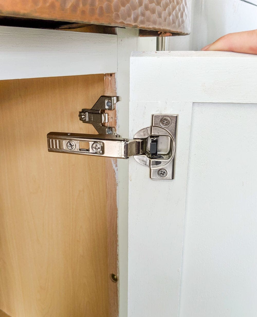 installing soft close hinges into clip on mounting plates