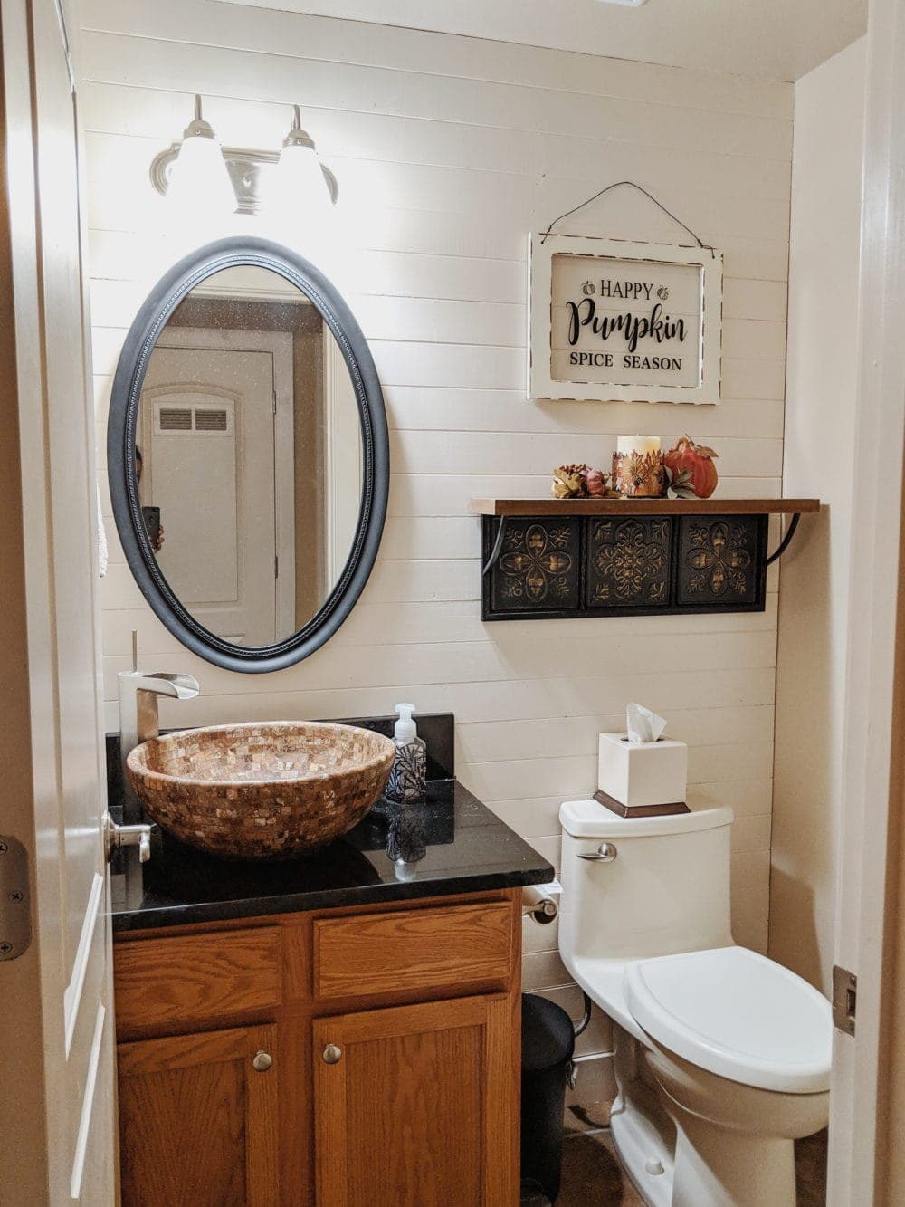 bathroom shiplap wall painted white