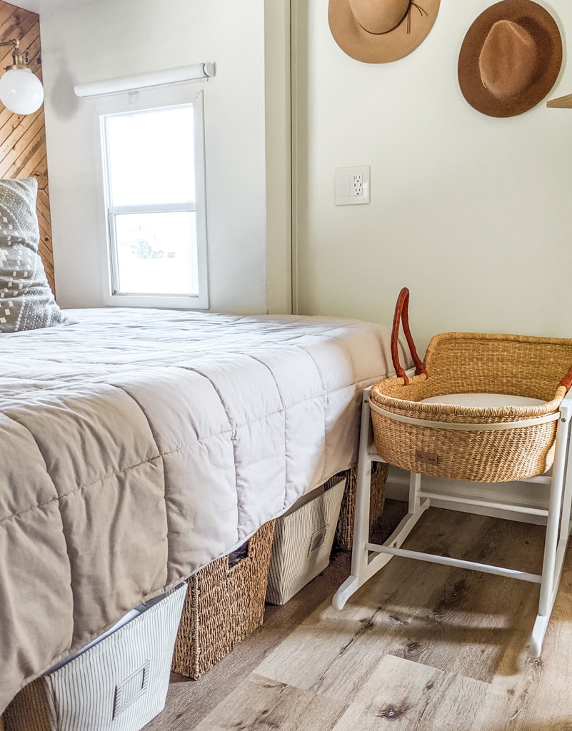 Moses basket in a small bedroom