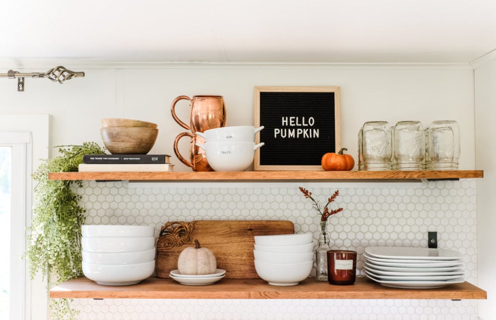 kitchen open shelving decorated for fall