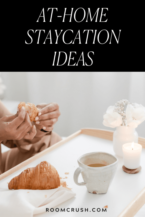 Woman enjoying tea and a croissant on her at-home staycation