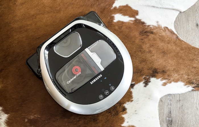 Samsung POWERbot vacuum on a cowhide rug