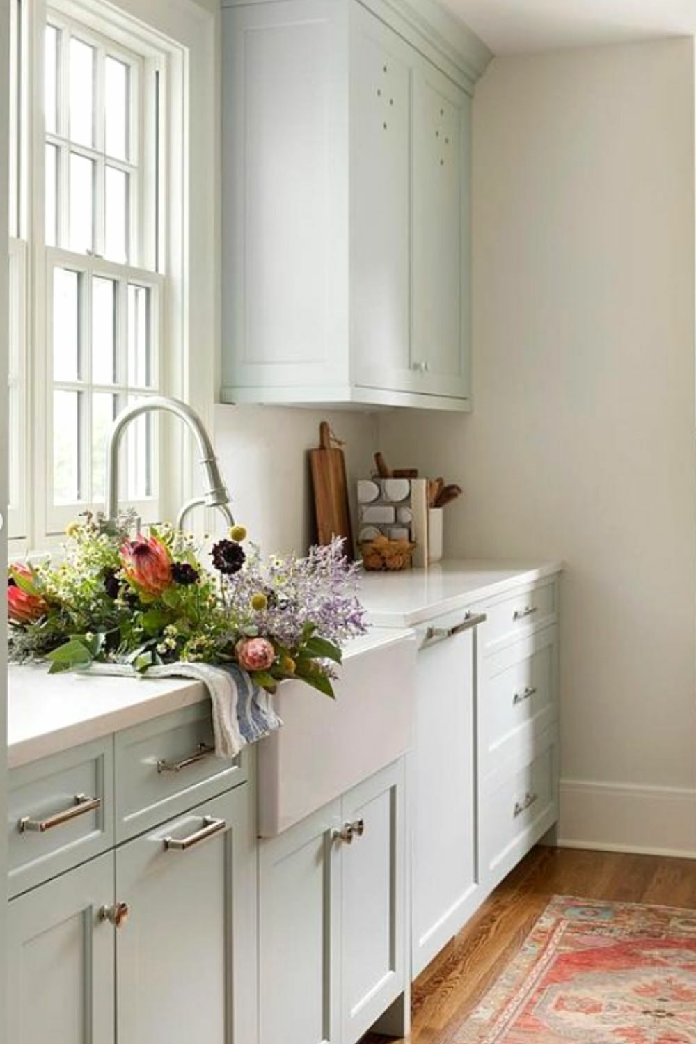 kitchen cabinets painted with Woodlawn Blue by Benjamin Moore