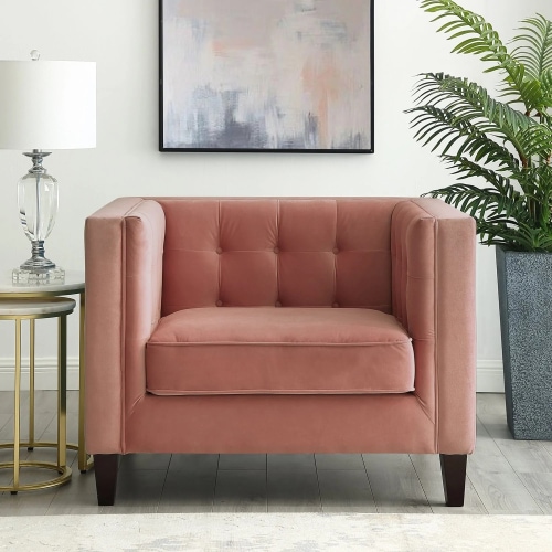 inspired home reviews pink lotte armchair next to table lamp and plant