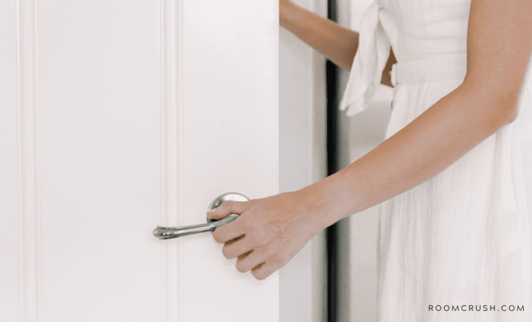 how to fix a door woman opening her door without any problems