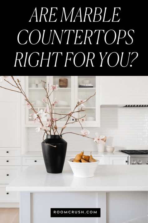 flower pot and fruit bowl showing contrast with a white marble countertop