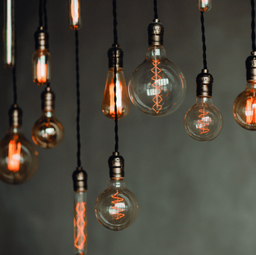 Hanging edison bulbs showing an easy way to incorporate the best apartment decorating tips