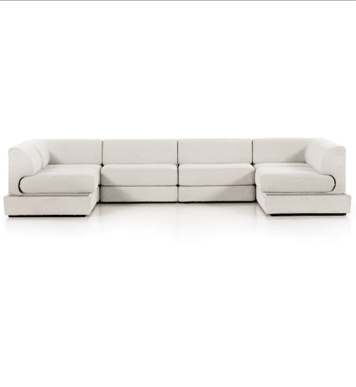 boucle couch in a modern yet cozy livingroom