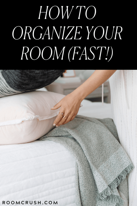 Woman showing how to organize your room with pillows and a throw