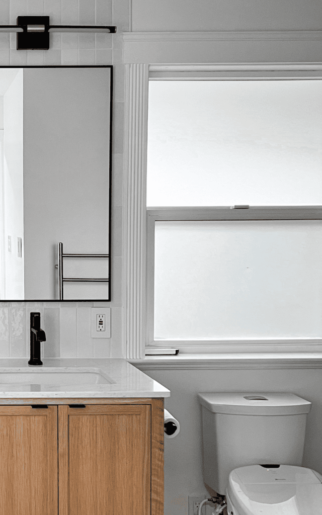 close up of how the bathroom windows turned out after applying privacy window film stickers