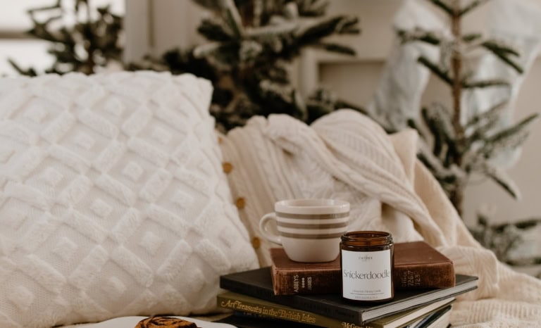 pillows on a grey sofa Unique and Useful Gifts for Interior Design Lovers