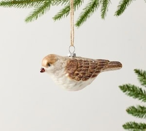 a bird ornament from a tree