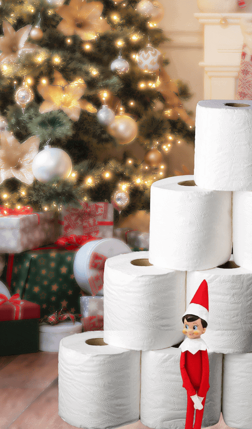 elf on the shel beside tower of toilet paper example of funny elf on the shelf ideas