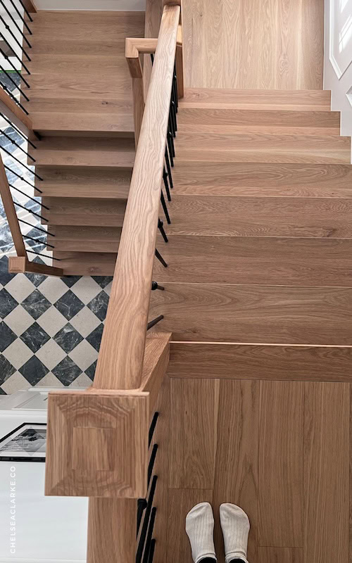 stairs makeover - tile floor next to hardwood white oak